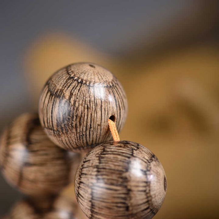 Bracelet de protection en perles de bois de Gnetum et pierres de Buddha Stones - image 11