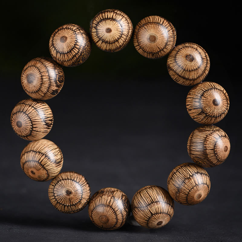 Bracelet de protection en perles de bois de Gnetum et pierres de Buddha Stones - image 5