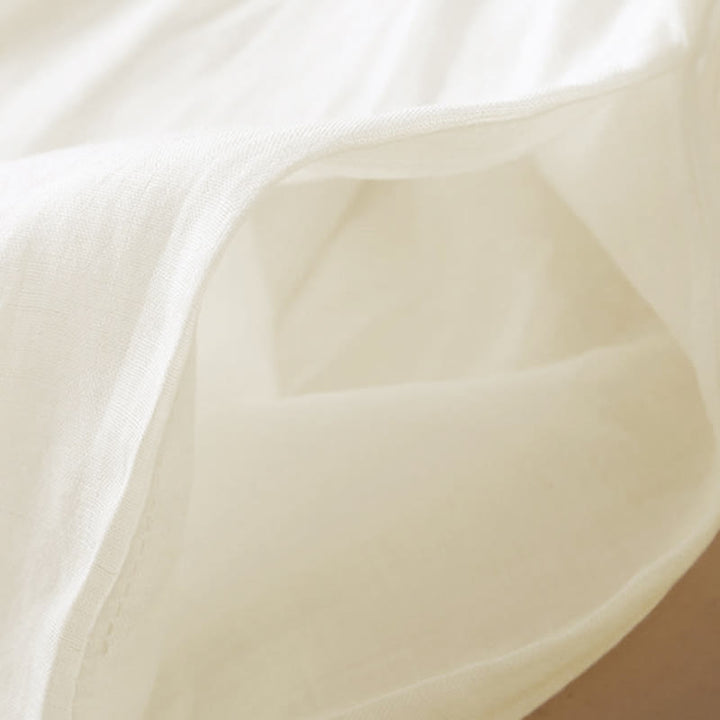 Robe mi-longue en coton à manches 9/4 et poches, broderie géométrique de Buddha Stones