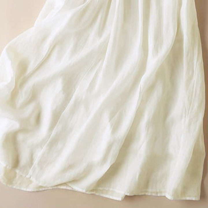 Robe mi-longue en coton à manches 9/4 et poches, broderie géométrique de Buddha Stones
