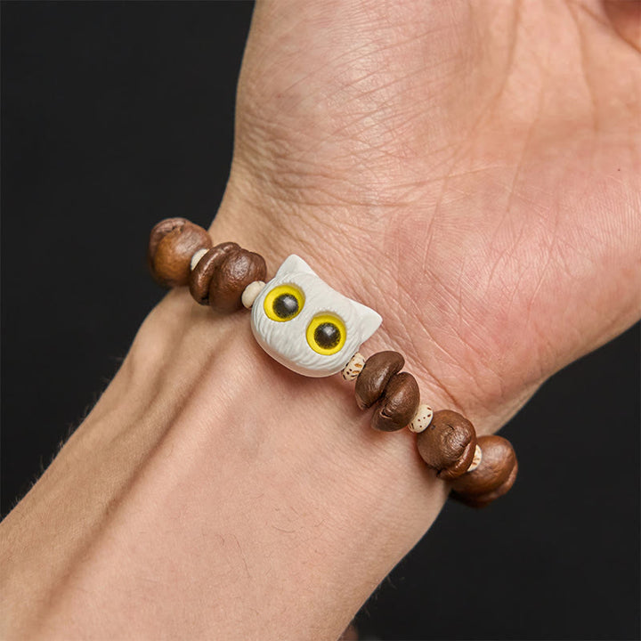 Bracelet de paix en forme de griffe et de patte de chat en grains de café naturels faits à la main avec des Buddha Stones - image 13