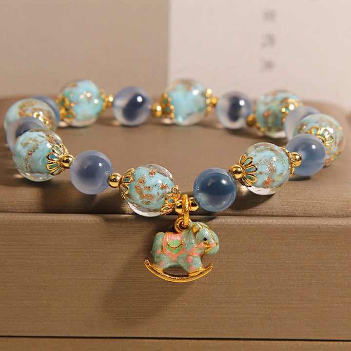 Bracelet de force du cheval en Buddha Stones naturelle et cristal blanc - Agate bonbon (circonférence du poignet : 15-19 cm) - image 1
