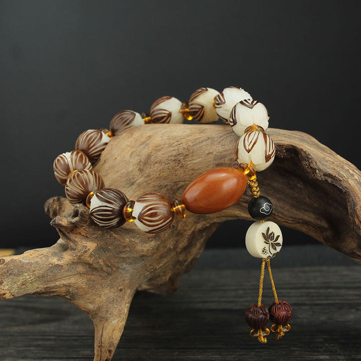 Bracelet tibétain Mala en Buddha Stones et graines de Bodhi blanches - Graine de Bodhi et noyau olivaire (circonférence du poignet : 16-18 cm) - image 1