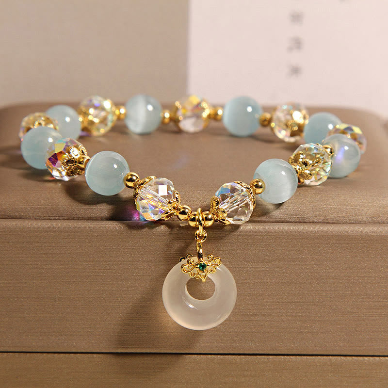 Bracelet d'équilibre avec boucle de paix et Buddha Stones, œil de chat bleu et cristal blanc - Œil de chat bleu (tour de poignet : 15-19 cm) - image 1