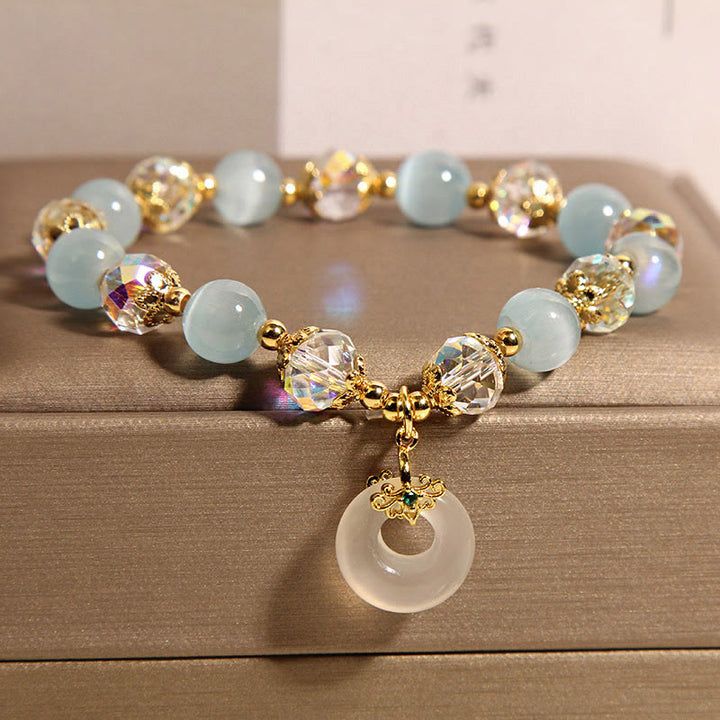 Bracelet d'équilibre avec boucle de paix et Buddha Stones, œil de chat bleu et cristal blanc - image 3
