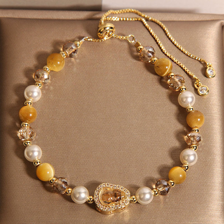 Bracelet de prospérité en pierre œil de chat jaune et perle de calebasse - Œil de chat jaune et perle (tour de poignet : 14-18 cm) - image 1