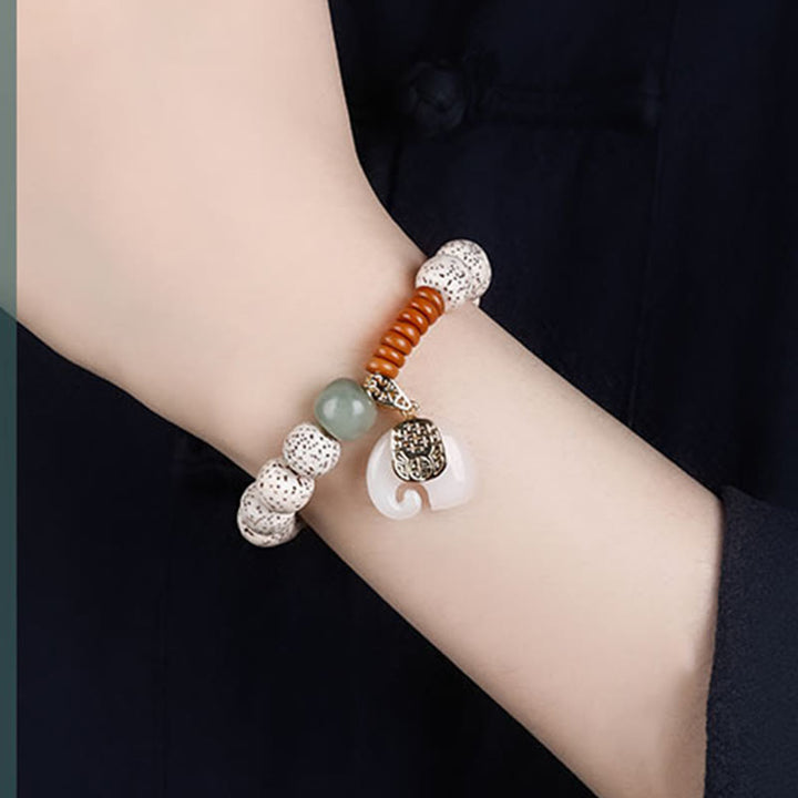 Bracelet de paix intérieure en Buddha Stones polies à la main, motif étoile, lune, graine de Bodhi, éléphant - image 10