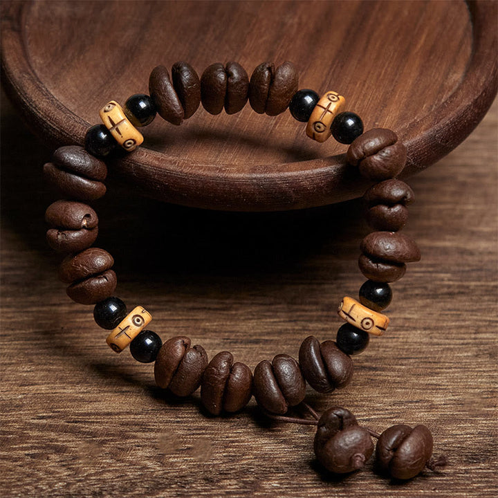 Bracelet de perles en os de yak et grains de café naturels Buddha Stones