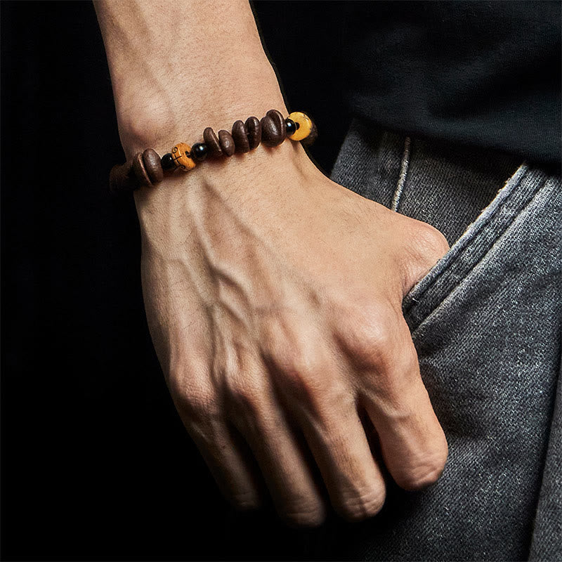 Bracelet de perles en os de yak et grains de café naturels Buddha Stones