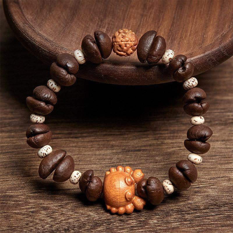 Bracelet en bois de wengé et perles de crabe en cuivre, fait à la main, avec des Buddha Stones et des grains de café - image 2