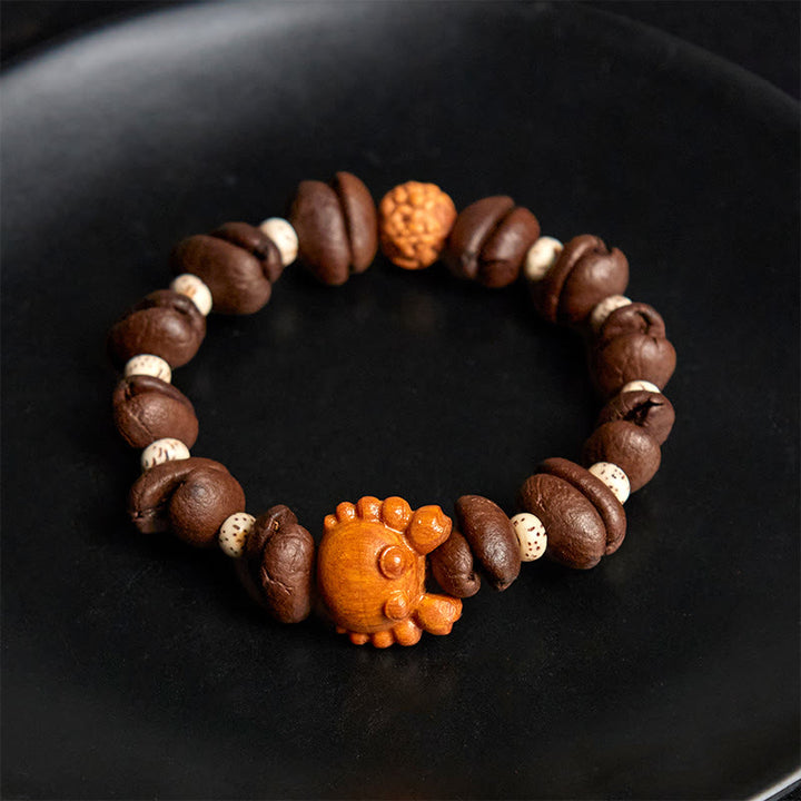 Bracelet en bois de wengé et perles de crabe en cuivre, fait à la main, avec des Buddha Stones et des grains de café - image 4