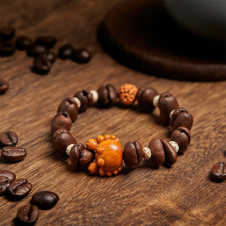 Bracelet en bois de wengé et perles de crabe en cuivre, fait à la main, avec des Buddha Stones et des grains de café - image 3