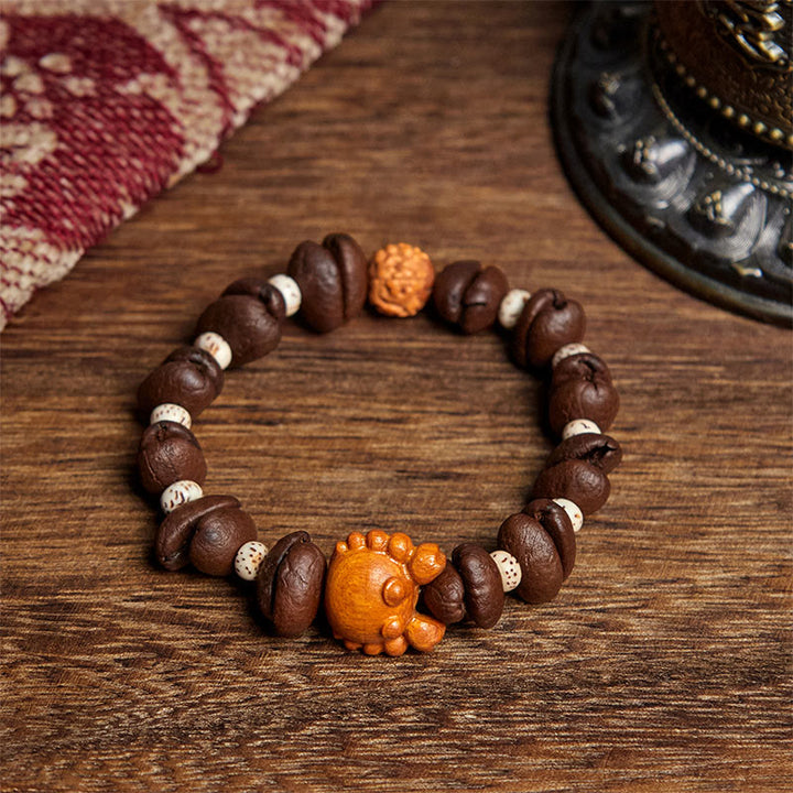 Bracelet en bois de wengé et perles de crabe en cuivre, fait à la main, avec des Buddha Stones et des grains de café - Grain de café (tour de poignet : 17,5 cm) - image 1
