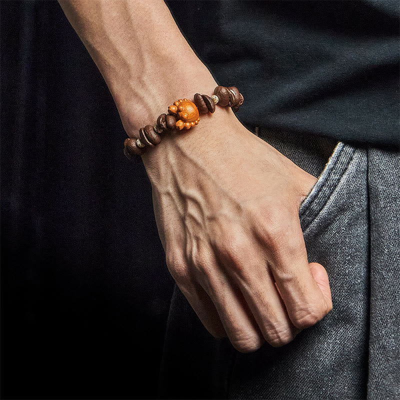 Bracelet en bois de wengé et perles de crabe en cuivre, fait à la main, avec des Buddha Stones et des grains de café - image 6