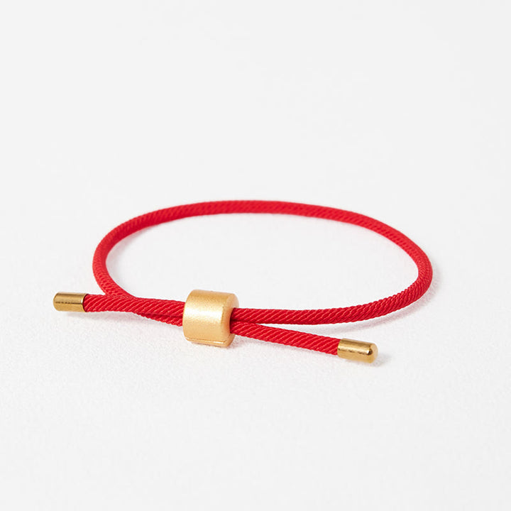 Bracelet porte-bonheur en fil rouge Buddha Stones