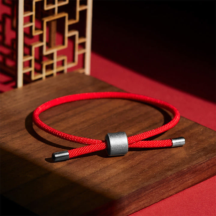 Bracelet porte-bonheur en fil rouge Buddha Stones
