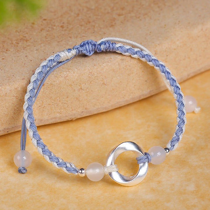 Bracelet de protection tressé en argent sterling 925 et perles d'agate blanche Mobius de Buddha Stones - Cordon bleu en argent sterling 925 (tour de poignet : 15-18 cm) - image 1