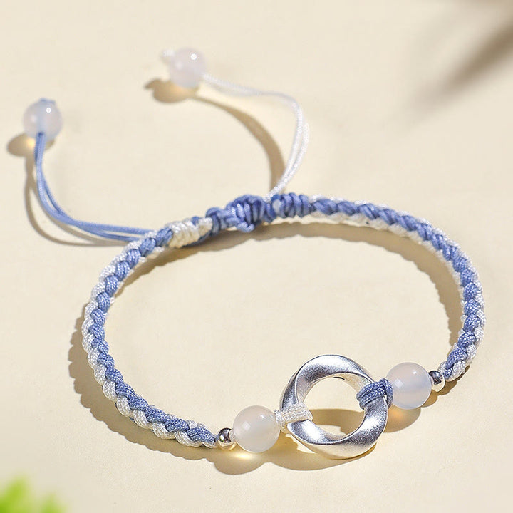 Bracelet de protection tressé en argent sterling 925 et perles d'agate blanche Mobius de Buddha Stones - image 1