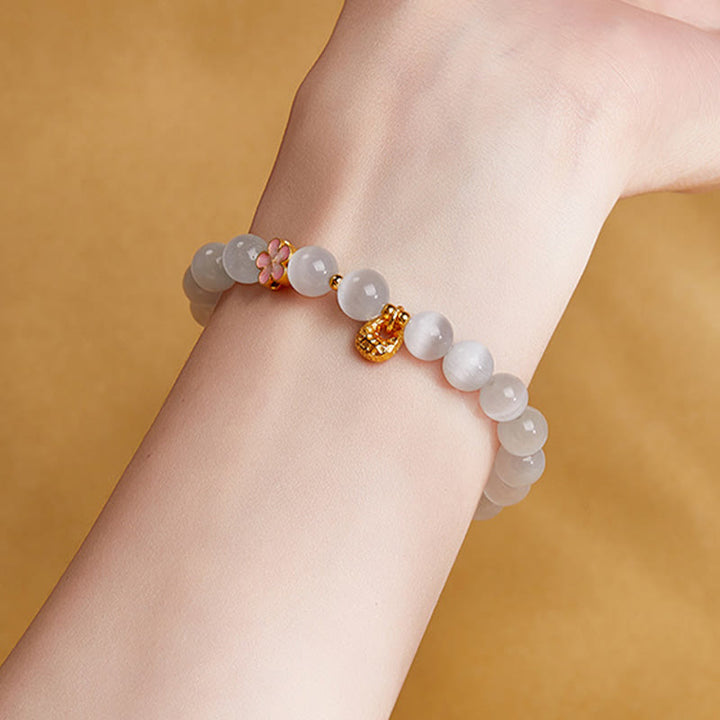 Bracelet porte-bonheur œil de chat blanc en argent sterling 925 avec Buddha Stones et fleur de pêcher - image 10