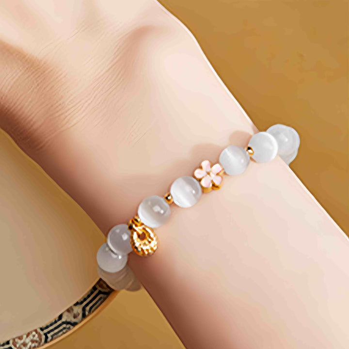 Bracelet porte-bonheur œil de chat blanc en argent sterling 925 avec Buddha Stones et fleur de pêcher - image 9