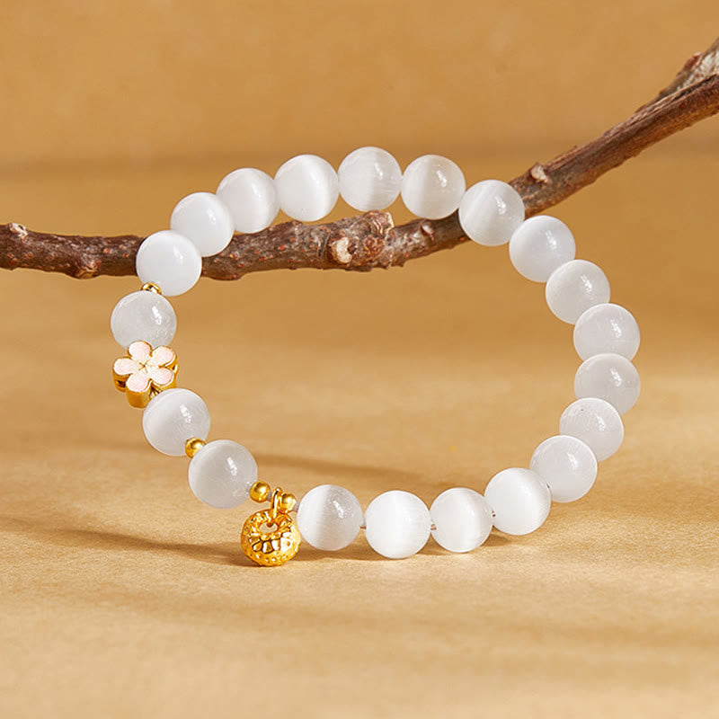Bracelet porte-bonheur œil de chat blanc en argent sterling 925 avec Buddha Stones et fleur de pêcher - image 1