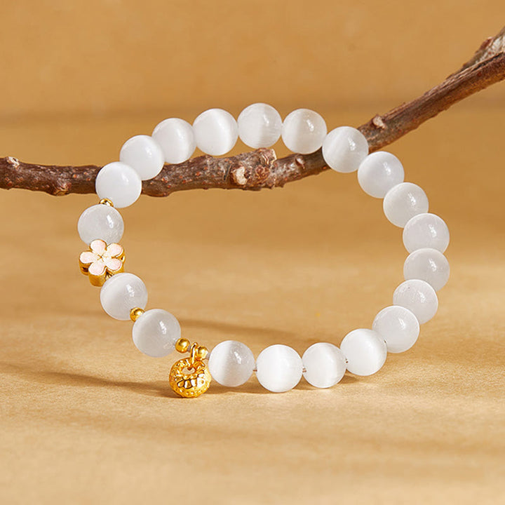 Bracelet porte-bonheur œil de chat blanc en argent sterling 925 avec Buddha Stones et fleur de pêcher - image 1