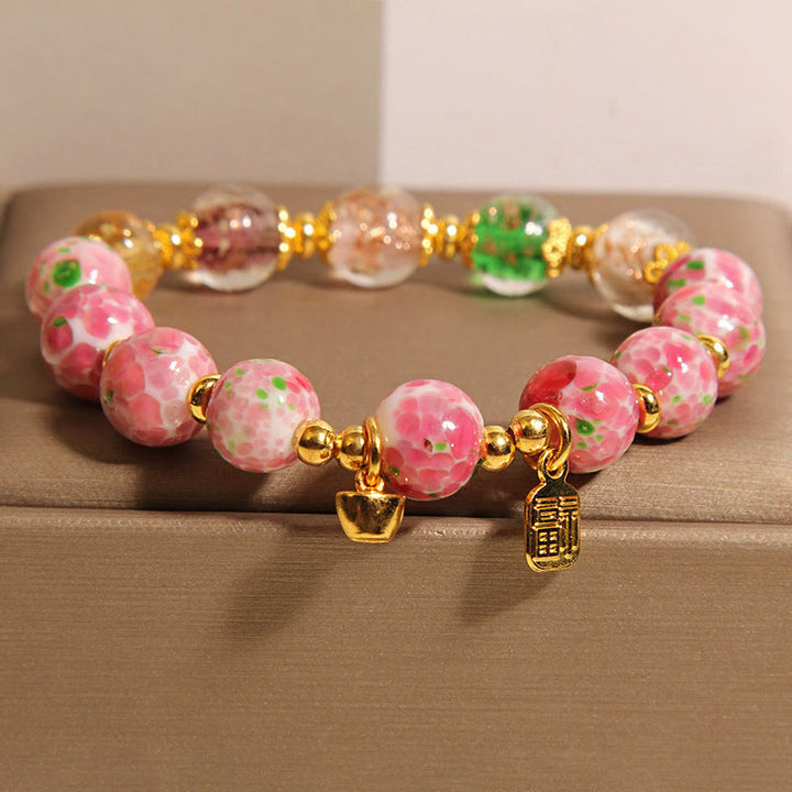 Bracelet porte-bonheur Liuli rose Buddha Stones et personnage Fu - Liuli (Tour de poignet 15-16 cm) - image 0