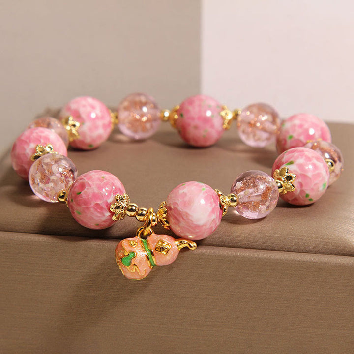 Bracelet Liuli en gourde et Buddha Stones - image 1