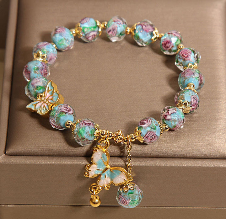 Bracelet Liuli avec breloque papillon et fleur de rose et Buddha Stones - image 3