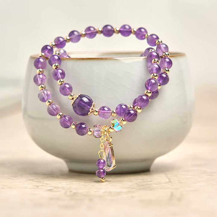 Bracelet multicouches en Buddha Stones
