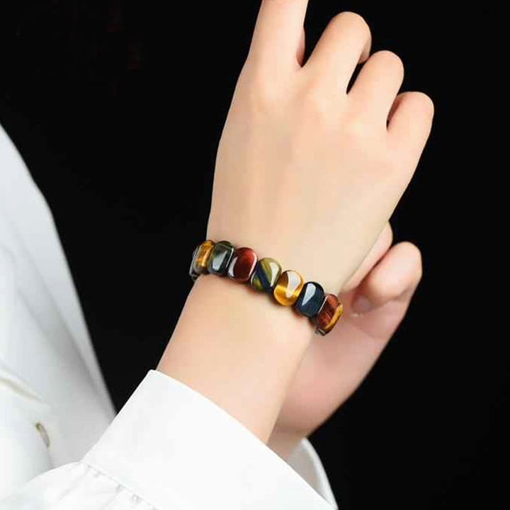 Bracelet de force en perles ovales œil de tigre de couleur naturelle Buddha Stones
