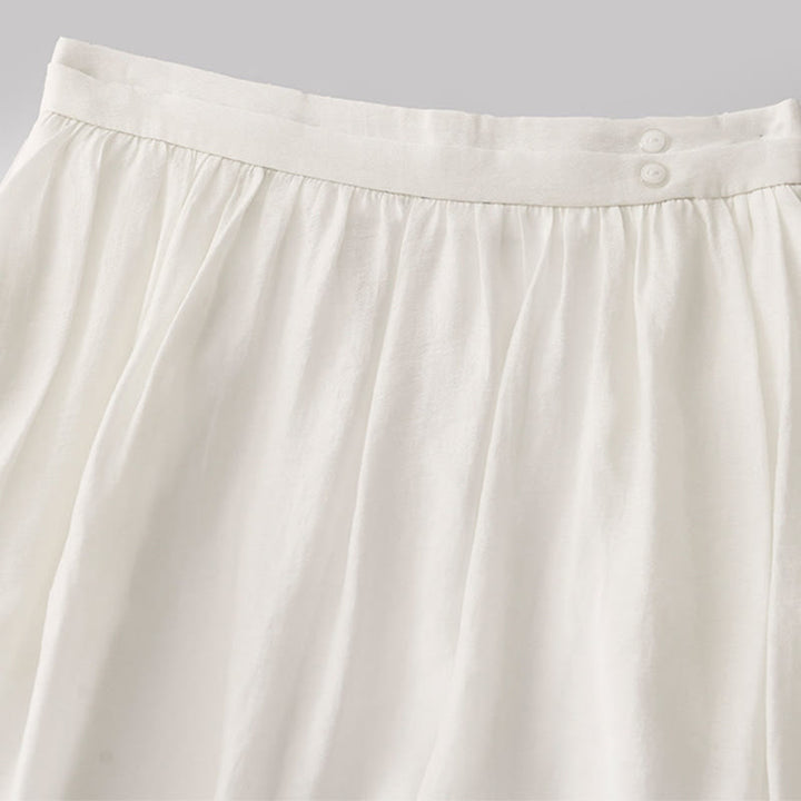 Jupe plissée simple à taille élastique avec poches pour femme Buddha Stones
