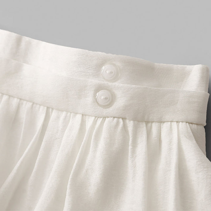 Jupe plissée simple à taille élastique avec poches pour femme Buddha Stones