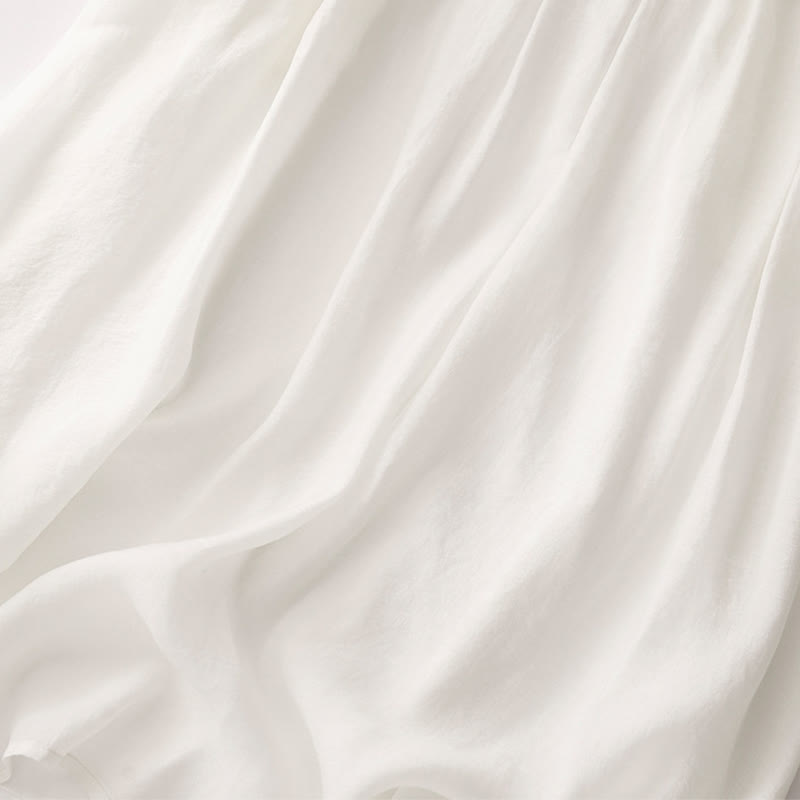 Jupe plissée simple à taille élastique avec poches pour femme Buddha Stones