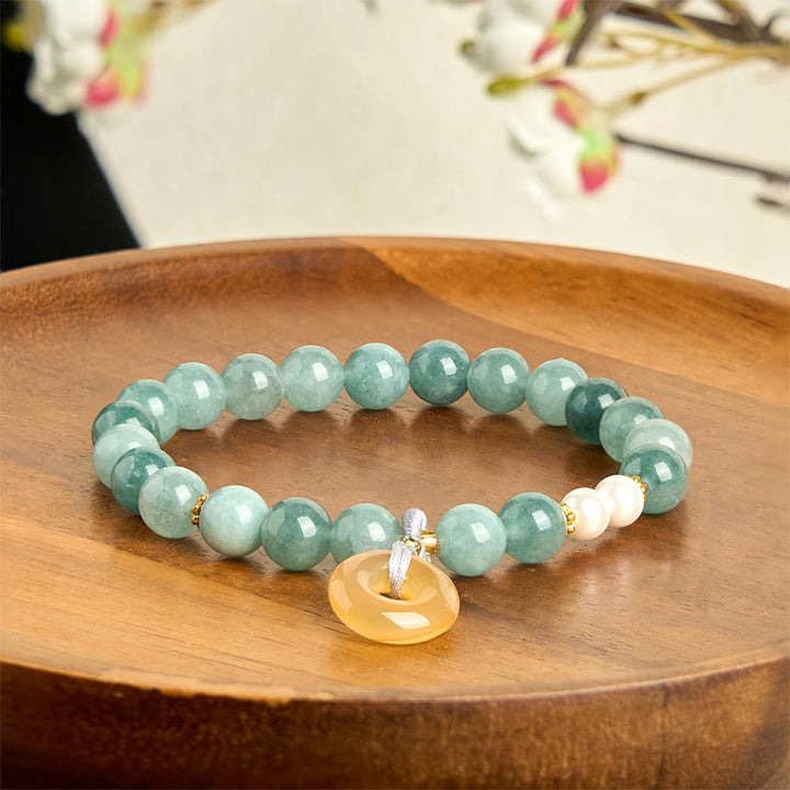Bracelet de prospérité en perles de jade bleu et Buddha Stones