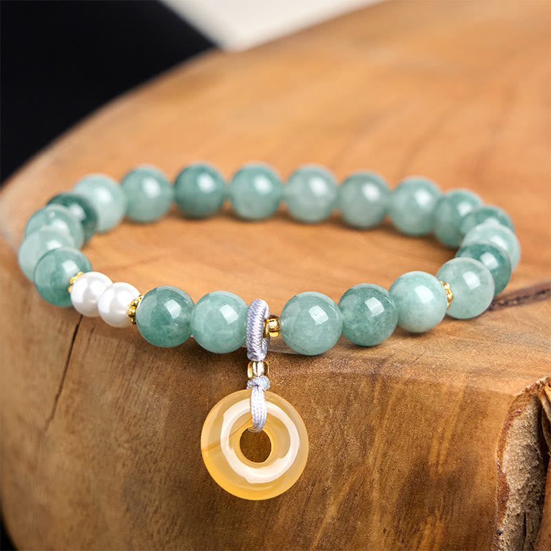 Bracelet de prospérité en perles de jade bleu et Buddha Stones