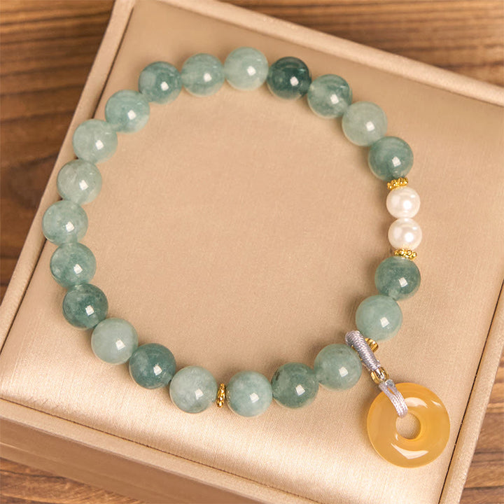 Bracelet de prospérité en perles de jade bleu et Buddha Stones