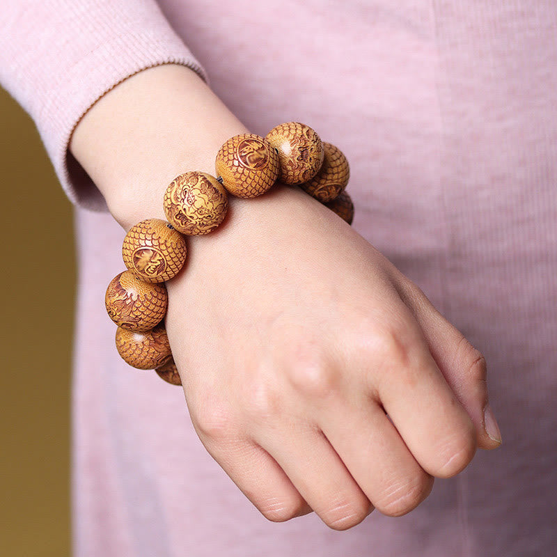 Bracelet en bois de santal sculpté avec des Buddha Stones et un dragon pour éloigner les mauvais esprits - image 3