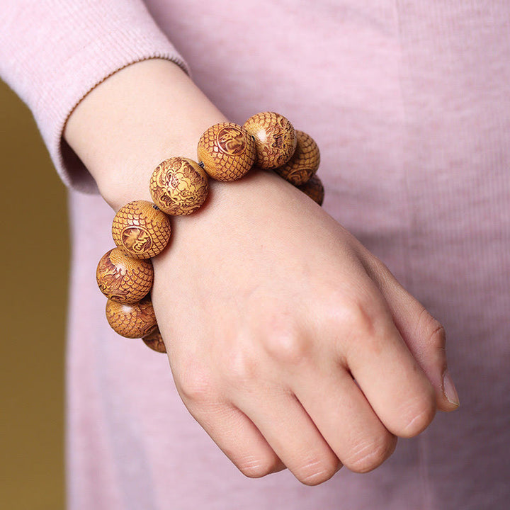 Bracelet en bois de santal sculpté avec des Buddha Stones et un dragon pour éloigner les mauvais esprits - image 3