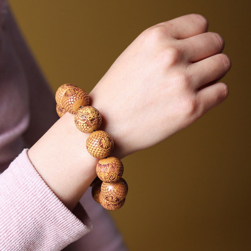 Bracelet en bois de santal sculpté avec des Buddha Stones et un dragon pour éloigner les mauvais esprits - image 4