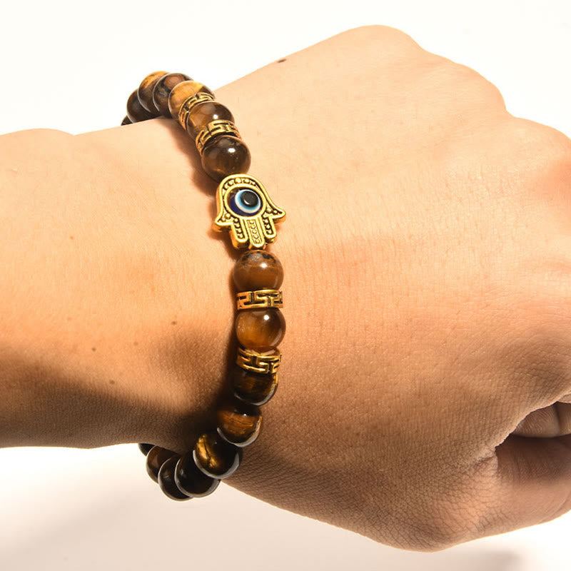 Bracelet courageux en perles œil de tigre et Buddha Stones - image 5