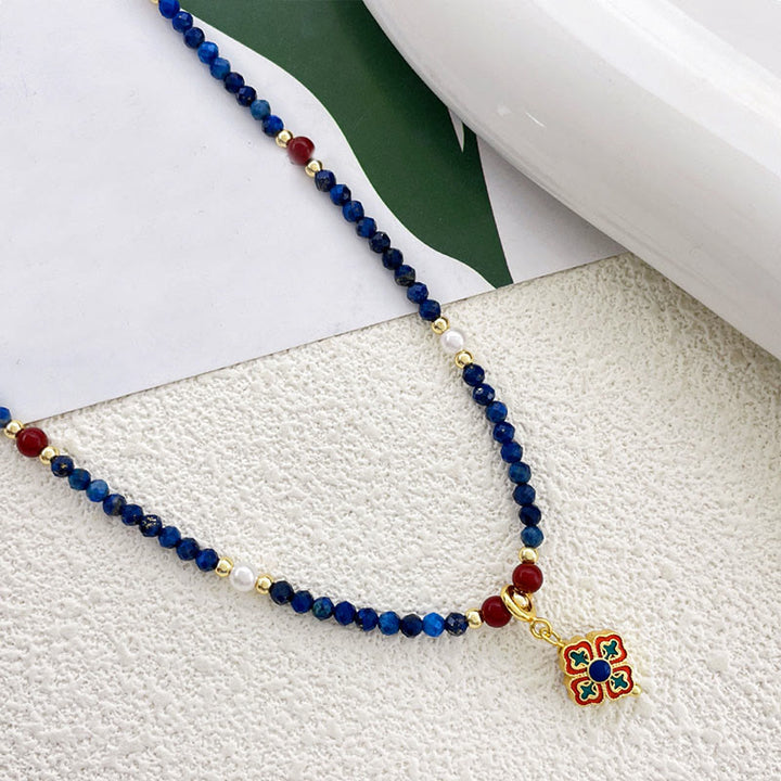 Collier pendentif positif en Buddha Stones , lazurite, lapis-lazuli et perle - image 1