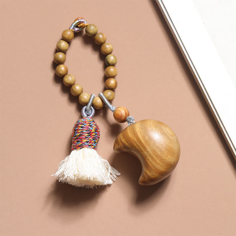 Porte-clés en corde de bois de santal vert naturel avec Buddha Stones et pompons, étoile, lune et abondance