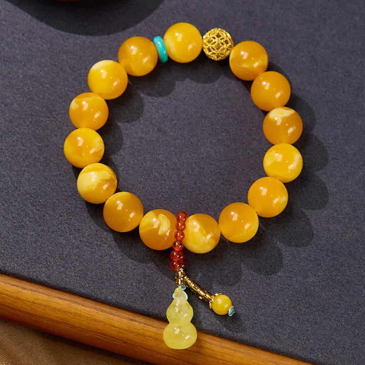Bracelet de confiance multicouche en gourde d'ambre avec Buddha Stones - Ambre 12 mm (circonférence du poignet : 14-16 cm) - image 1