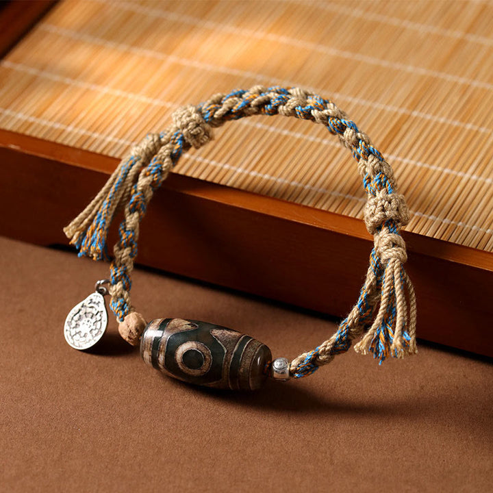 Bracelet tressé en perles dzi tibétaines faites à la main avec Buddha Stones - Perle Dzi (tour de poignet 14-16 cm) - image 1