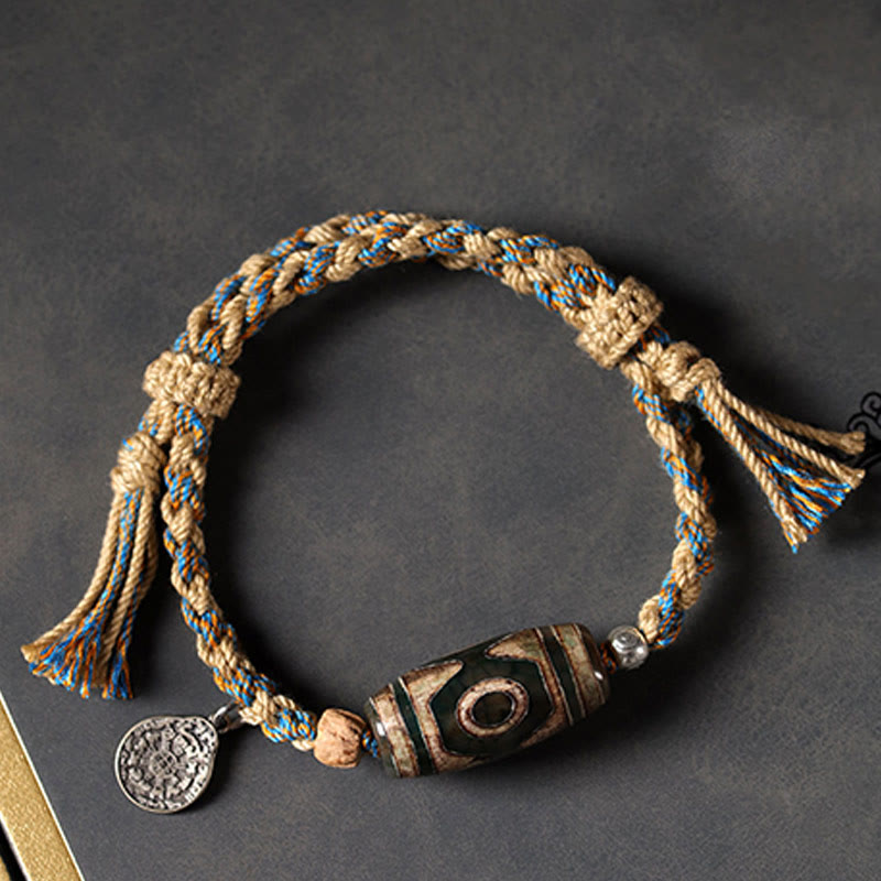 Bracelet tressé en perles dzi tibétaines faites à la main avec Buddha Stones - image 3