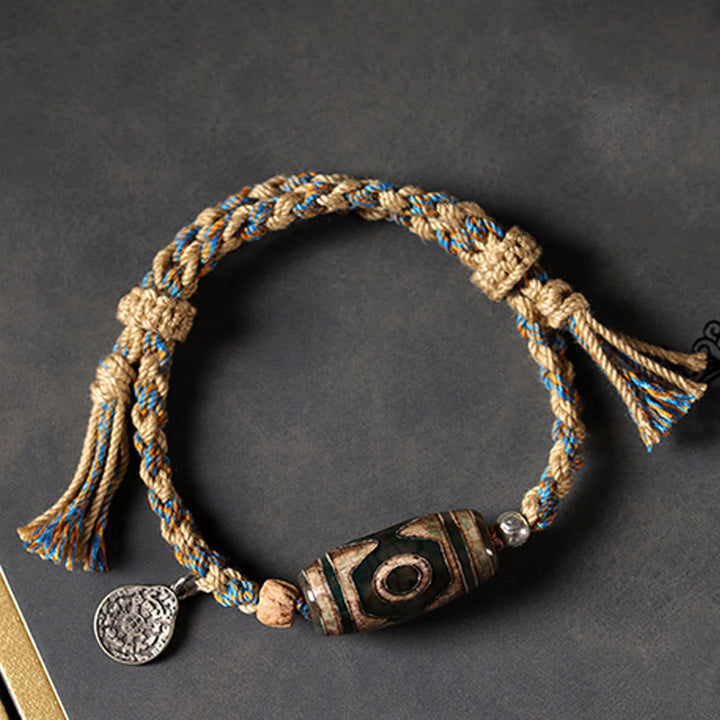 Bracelet tressé en perles dzi tibétaines faites à la main avec Buddha Stones - image 3