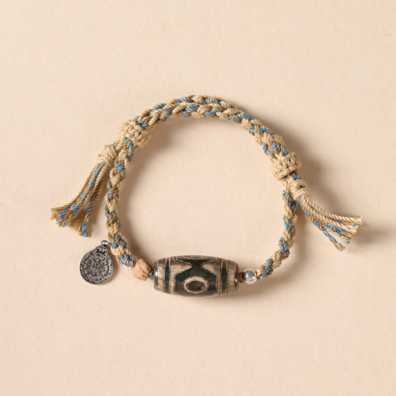 Bracelet tressé en perles dzi tibétaines faites à la main avec Buddha Stones - image 12