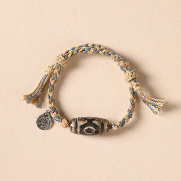 Bracelet tressé en perles dzi tibétaines faites à la main avec Buddha Stones - image 12