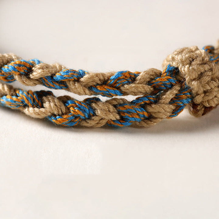 Bracelet tressé en perles dzi tibétaines faites à la main avec Buddha Stones - image 11